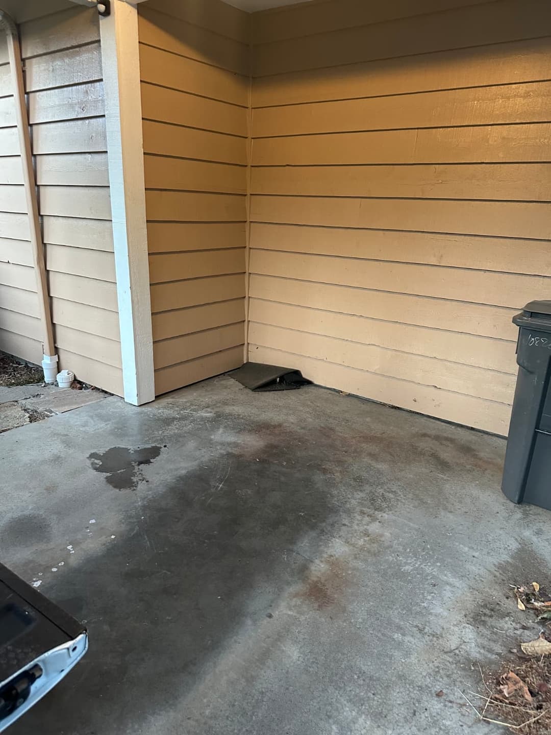 Custom cabinet installation with decorative panel doors and finished wood flooring